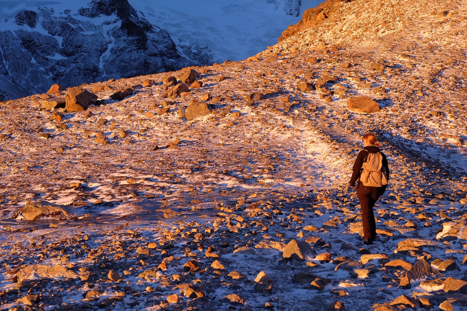 Sample memoir cover — a hiker on a glacial moraine at sunset